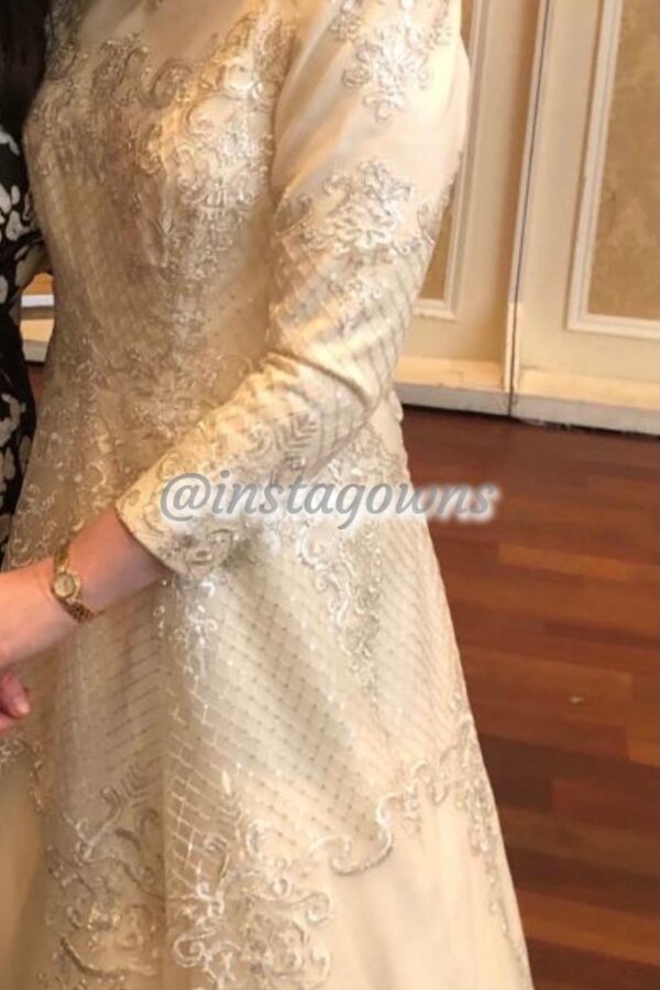 Beautiful custom Raquel ivory metallic Gown for sale
