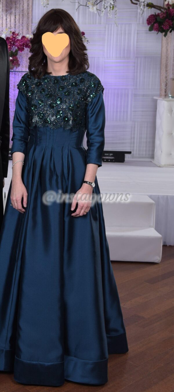 Beautiful teal with lace and beading Gown for sale