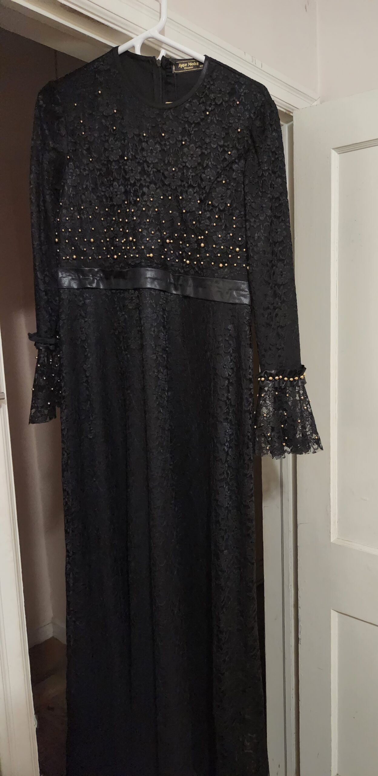 Black lace gown with gold beads for sale