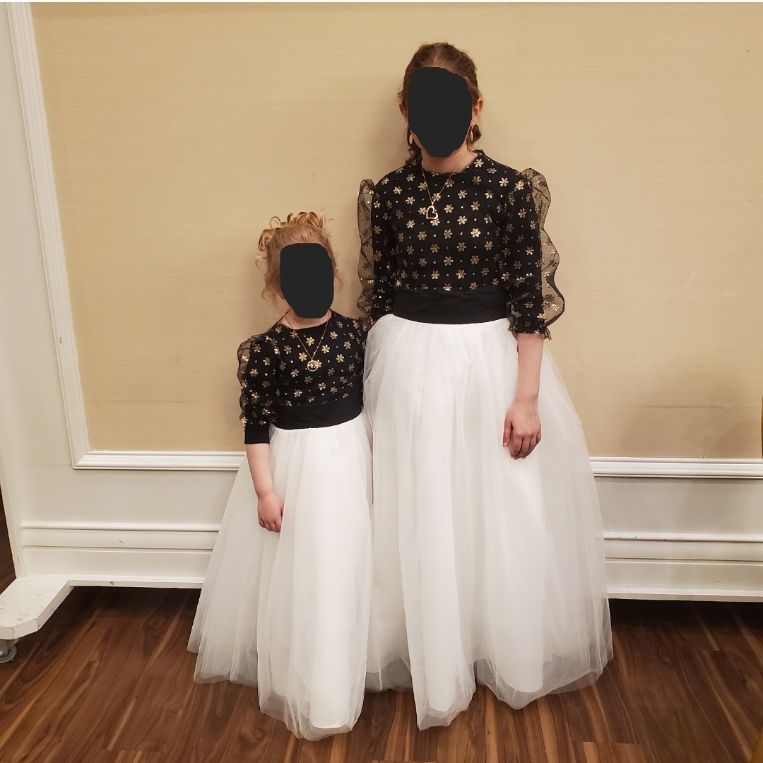 Two matching adorable girls gowns for sale