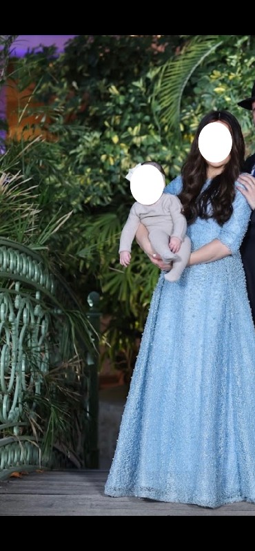 Beautiful light blue gown with pearls for sale