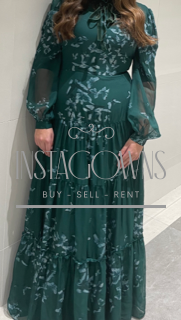 Elegant Raquel Couture green gown for rent