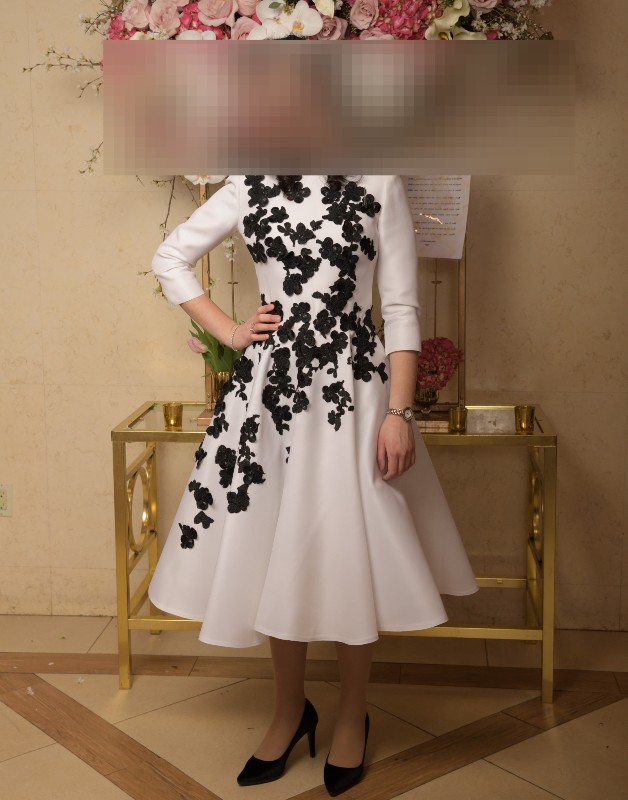 Magnificent Off white dress with Black flower detail for sale