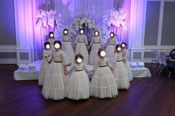 Beautiful Children's ivory/mauve gowns for sale