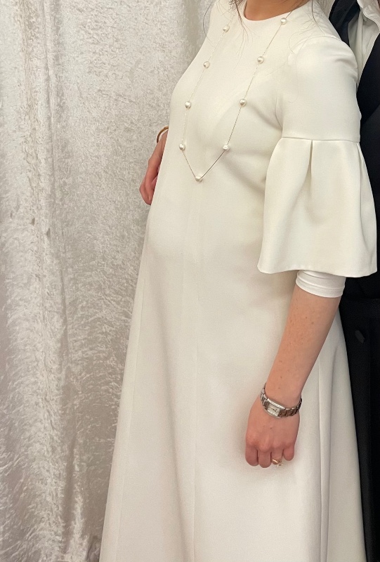 Slenderizing maternity off white gown for sale