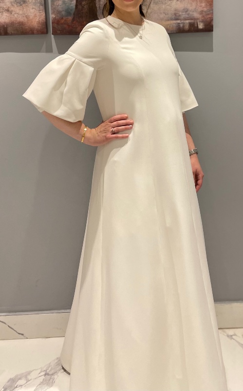 Slenderizing maternity off white gown for sale
