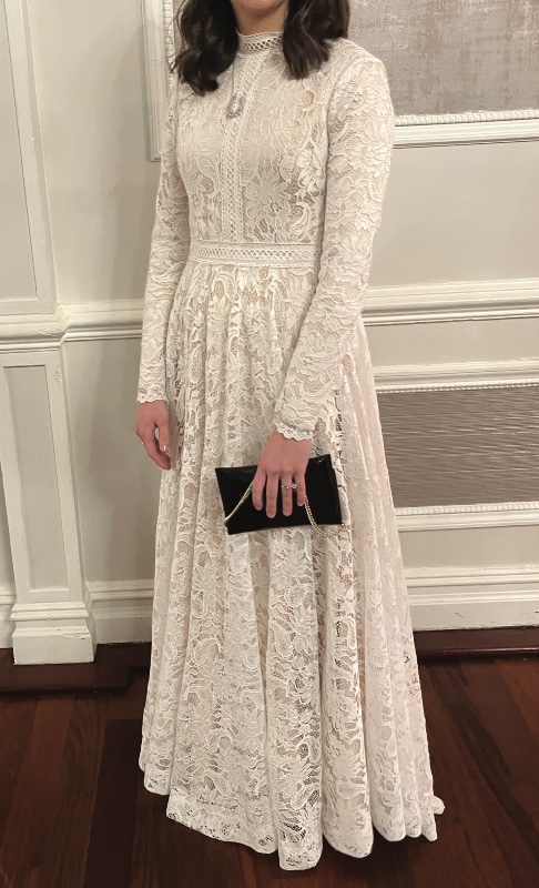 Beautiful off white lace gown with nude lining for sale