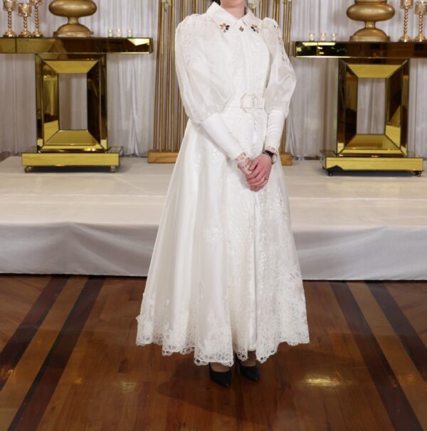 Beautiful Custom made Costarellos ivory women’s dress for rent