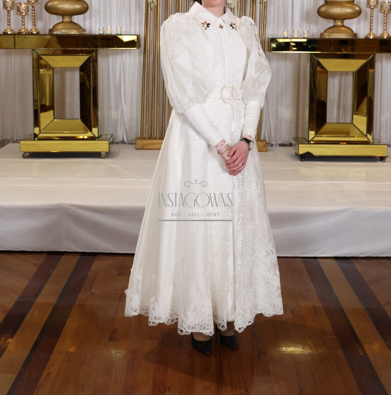 Beautiful Custom made Costarellos ivory women’s dress for rent