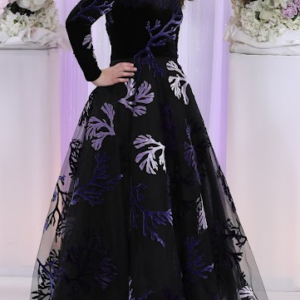 Beautiful black brand name gown with colored axon,velvet top and tulle for sale