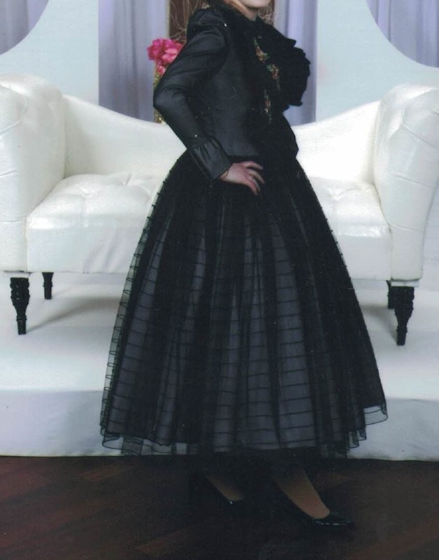 Beautiful black tulle dress lined with white lining and beading in the front for sale