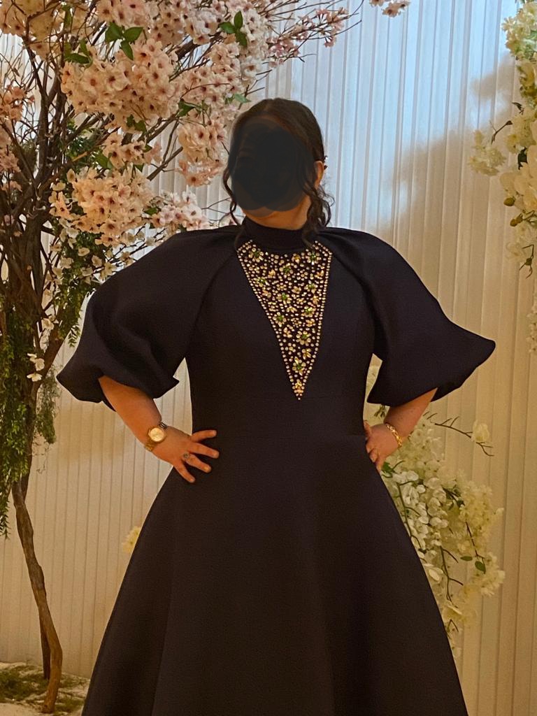 One of a kind, hand beaded, slenderizing gown for rent/sale