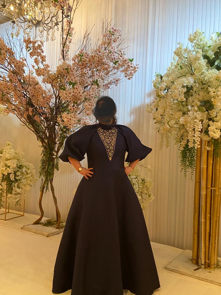 One of a kind, hand beaded, slenderizing gown for rent/sale