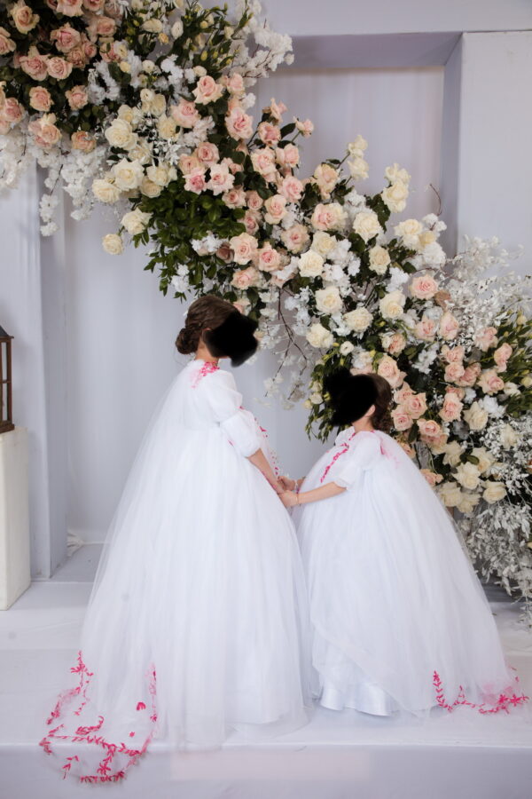 Custom one of a kind little girls white tulle gowns with pink embroidery and bridal train for sale