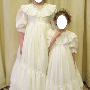 Two Beautiful white girls gowns for sale.