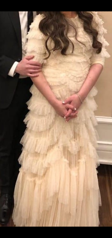 Magnificent, slenderizing cream gown for sale