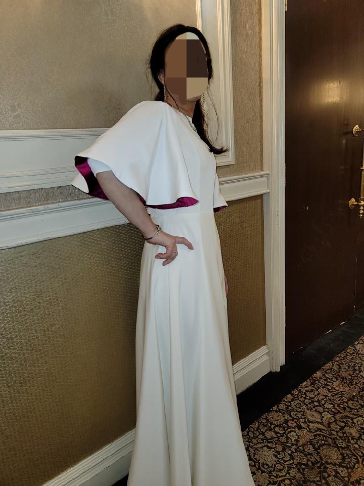 Custom white gown with a pop of magenta for sale