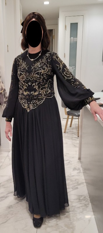 Exclusive designer gown from Shimmers with intricate beading and glamorous sleeve for rent/sale