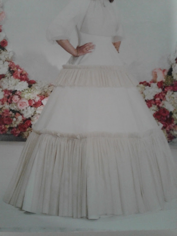 Ivory/Gold tulle shimmer gown for rent/sale