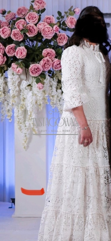 Magnificent white eyelet Miri gown for rent