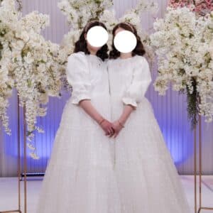 Magnificent custom white twin gowns for sale
