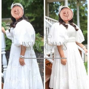Aje white dress with smocking and puff sleeves