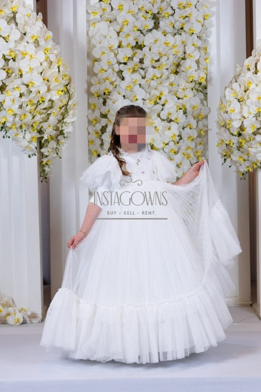 Beautiful coordinating white tulle gowns with pastel floral embroidery for sale