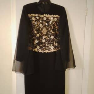 Elegant black slenderizing dress with magnificent heavy lace, flowy chiffon from shoulders down.