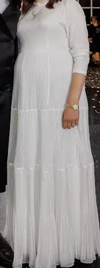 Beautiful slenderizing white maternity gown for sale