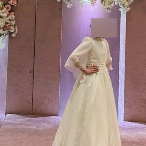 A beautiful organza ivory gown for sale.