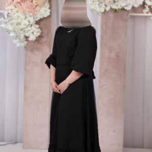 Beautiful slenderizing black shimmer long gown for sale or rent.