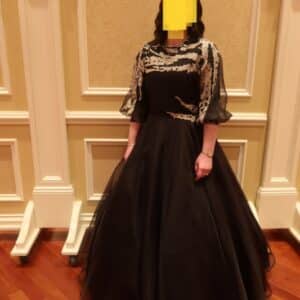 Black Womens gown with bronze/gold applique to rent/sale.