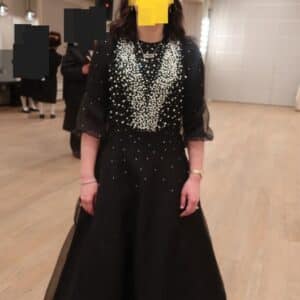 Beautiful black womens gown with pearls for sale/rent.