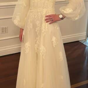 Beautify Miri's ivory gown for sale.